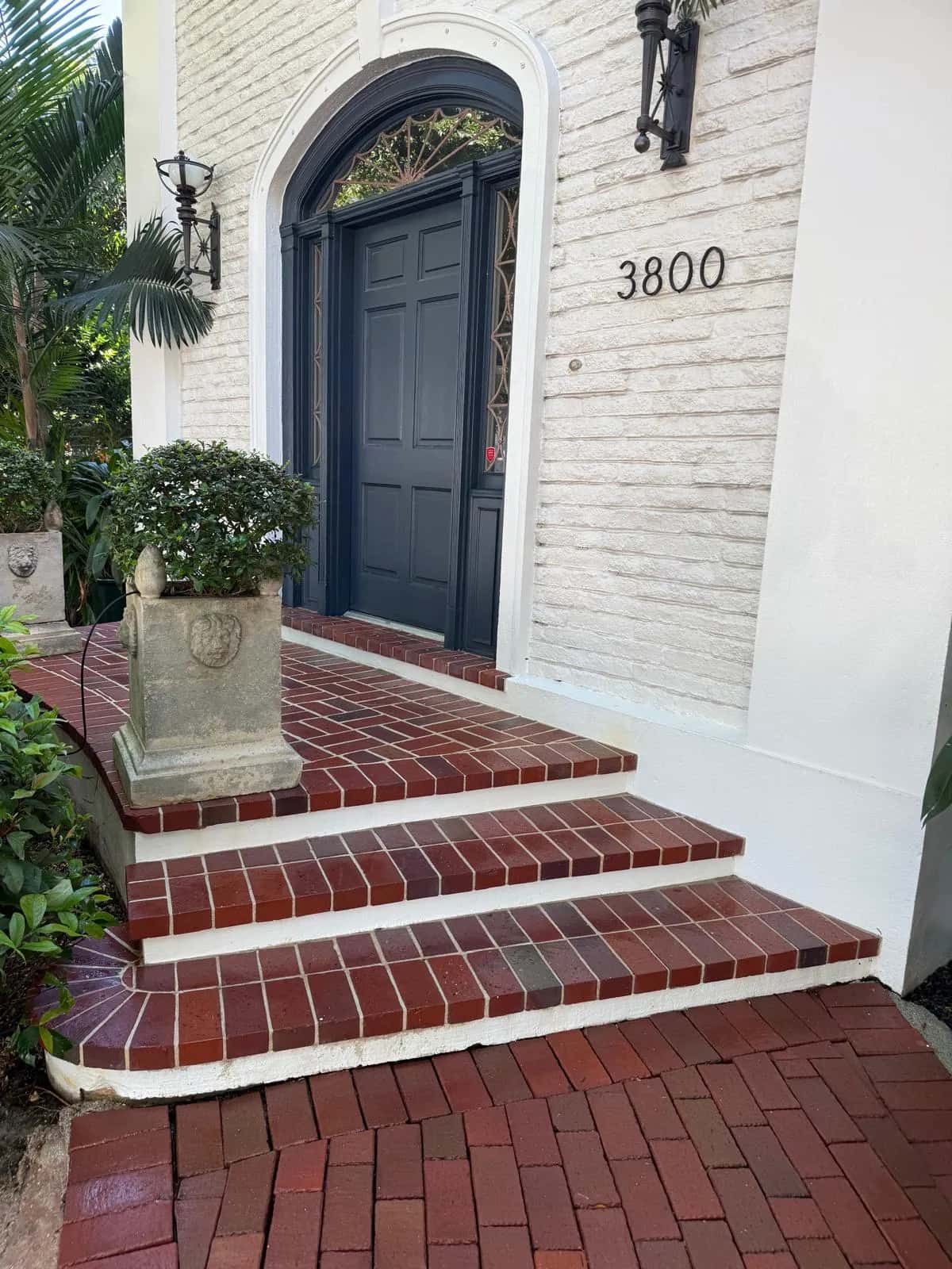 Rich red brick front steps after pressure cleaning