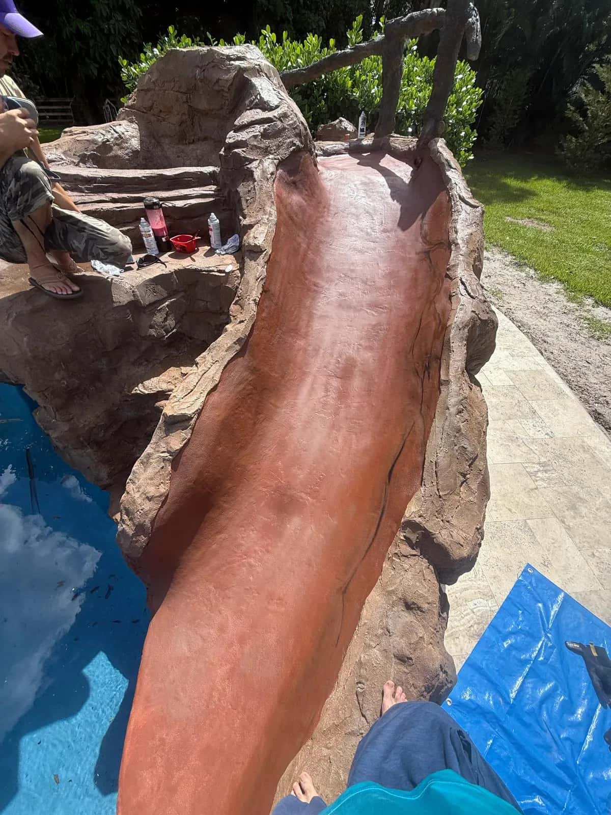 Rock pool slide after refinishing and painting