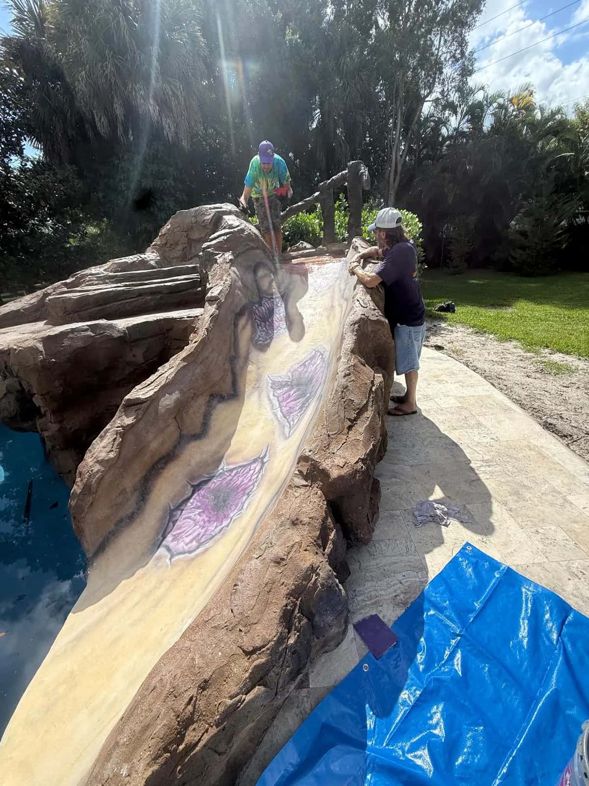 Rock pool slide being refinished