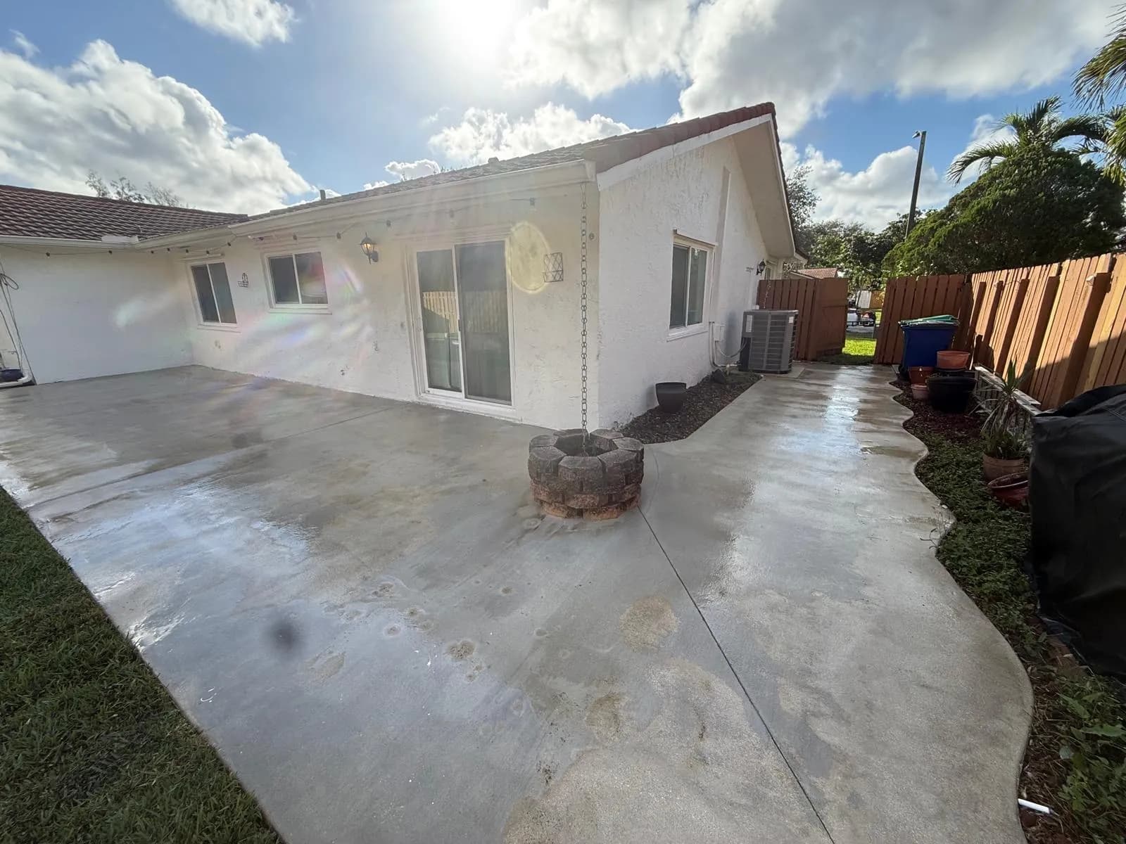 Concrete patio cleaned evenly from edge to edge — Looking New, serving Wilton Manors