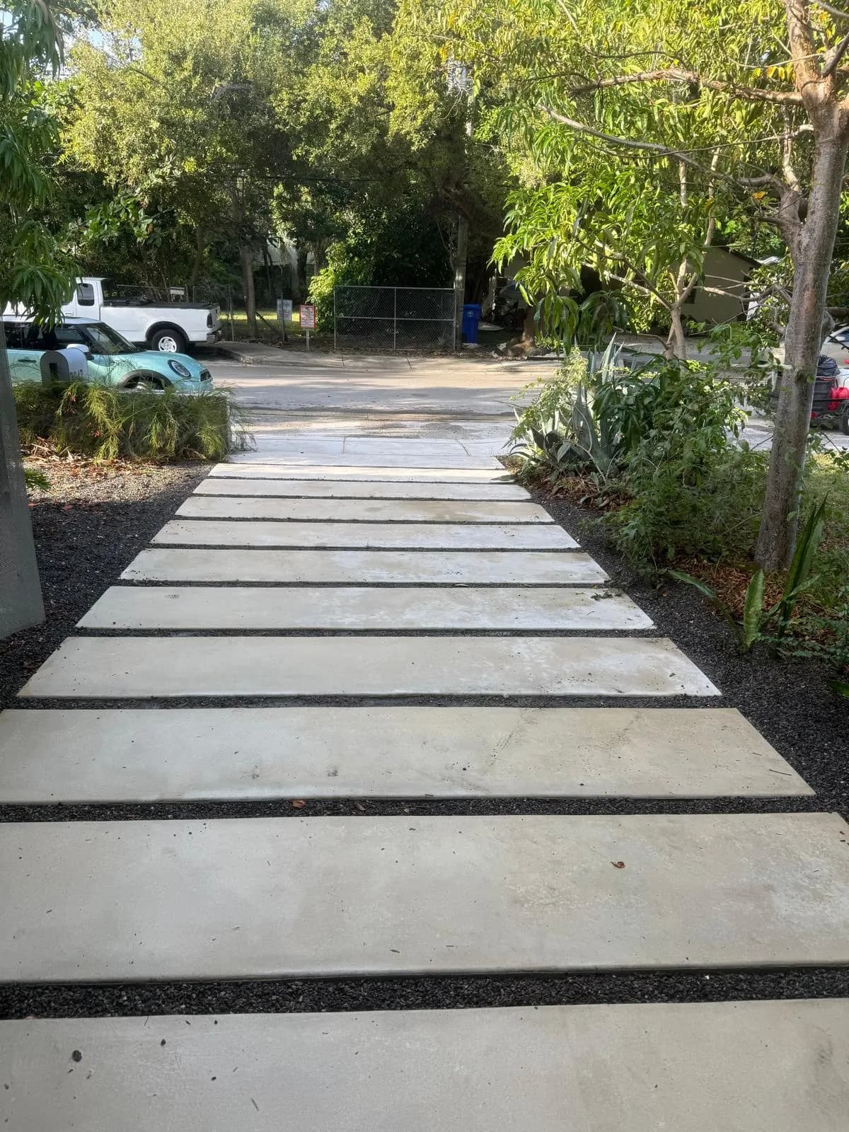 Concrete slab walkway after pressure cleaning — Looking New, serving Sunrise